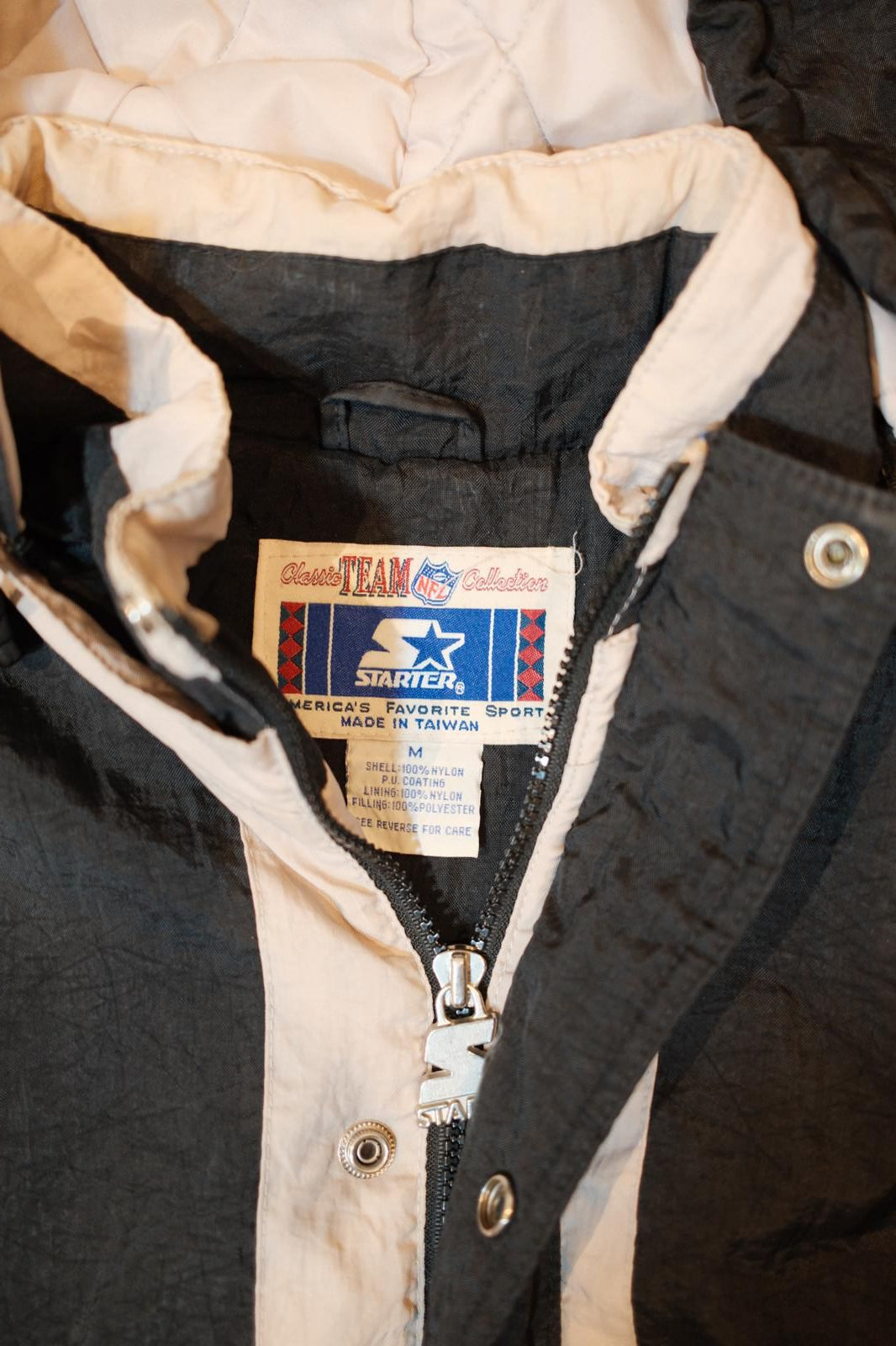 Vintage 90’s Starter NFL Raiders Puffer Jacket